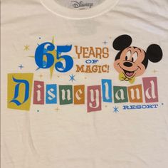 The Shirt Is New In The Box And Has Not Been Opened! Get This Limited Addition T-Shirt While You Can! Vintage Disney Tshirt, Disney Scrubs, Womens Scrub Tops, Retro Disney, 65th Anniversary, White Short Sleeve Shirt, Usa Tee, Vintage Winnie The Pooh, Stitch Shirt