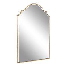 a gold framed mirror on a white wall