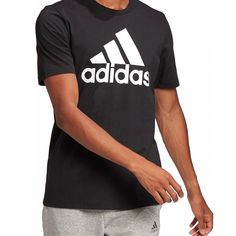 -Adidas Logo T-Shirt -Graphic T-Shirt -Comes In All Sizes Black Relaxed Fit T-shirt With Three Stripes, Black Athleisure Tops With Logo, Adidas Logo Graphic Tee For Sports, Basic Adidas T-shirt With Three Stripes, Adidas Graphic Tee For Sports, Adidas Sportswear T-shirt With Letter Print, Adidas Basic T-shirt With Three Stripes, Black Adidas Logo T-shirt Athleisure, Black Adidas T-shirt With Logo