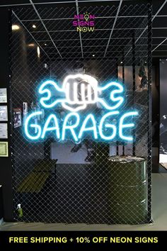 neon sign on the side of a building that says garage free shipping + 10 % off neon signs