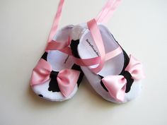 "This listing is for Moo Cow Baby Soft Ballerina Slippers. It has a pink bow embellishment & pink ribbon ties. This shoes are soft for those delicate baby or infant feet. The ribbon tie are long enough to wrap/tie around the ankle.  Match this shoes with this tutu set: http://www.etsy.com/listing/78499976/tutu-mootu-cow-pink-tutu-baby-toddler  For custom orders, please specify the size. You can use this table for rough measurements:  0-3 months: 4\" 3-6 months: 4.25\" 6-9 months: 4.5\" 9-12 months: 4.75\" 12-18 months: 5\" For shoes sizing: measure your child feet from heel to tip of big toe in inches and order the next size up to make sure it fits. Our shoes measures small and the inches equivalent is the measurement  outside not the inside. If you prefer exact sizing on your babies feet, Cute Pink Booties With Soft Sole, Cute Pink Booties For First Birthday, Cute Pink First Birthday Booties, Cute Booties For First Birthday In Spring, Cute Pink Booties For Gift, Cute Pink Booties As Gift, Cute Soft Sole Booties As Gift, Cute Closed Toe Booties For First Birthday, Cute Closed Toe Booties For Playtime