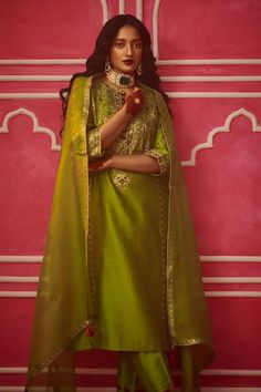 Lime green kurta with zardozi embroidered paisley floral motifs embellished with sequins. Comes with pant and dupatta. - Aza Fashions Green Art Silk Anarkali Set With Intricate Embroidery, Green Meenakari Anarkali Set For Eid, Eid Green Sharara With Meenakari Details, Festive Green Meenakari Sharara, Green Meenakari Sharara, Festive Green Meenakari Sets, Green Dola Silk Dupatta With Intricate Embroidery, Green Meenakari Anarkali Set For Festivals, Green Dola Silk Sharara With Intricate Embroidery