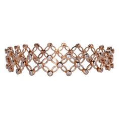 This is part of Chairish’s Fine Jewelry assortment.  Estate Italian SI.RO Gioelli 18K rose gold diamond convertible ring or bracelet. This 18 karat rose gold ring converts to a bracelet. The flex ring bracelet features 60 diamonds at 1.32 carat total weight. The diamonds are VS1 clarity and G-H color. The ring can go down to a size 6 and the bracelet can expand to 2.375" Diameter. This piece is appraised at $11,000 and is sold by SI.RO Gioielli.  Exact dimensions for this item are unknown.  Plea Rose Gold Bangle With Single Cut Diamonds, Elegant Rose Cut Diamond Bracelets For Formal Occasions, Flexible Rose Gold Diamond Bracelet, Luxury Yellow Gold Bracelets With Rose Cut Diamonds, Hand-set Rose Gold Diamond Bangle Bracelet, Hand Set Diamond Rose Gold Bracelet, Rose Gold Diamond Bangle With Single Cut Diamonds, Hand Set Rose Gold Diamond Bangle Bracelet, Rose Gold Hand Set Diamond Bangle Bracelet