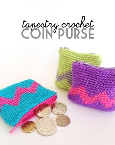 two crocheted coin purses sitting next to each other