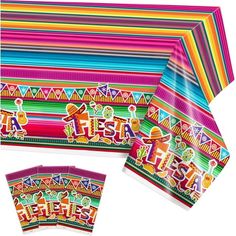 colorful paper plates and napkins with the word fiesta on them