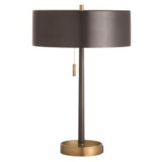 a black lamp with a gold base and a black shade on the bottom half of it