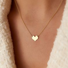 Self-love is the most important love there is. They say that no one will ever love you like you. This sweetheart gold pendant necklace is a stylish reminder to be gentle, compassionate, and unconditionally loving to yourself.  * The Listing is for a Single Heart Necklace. ▶  Features * Made to Order. * Gold KT: 14K Solid Gold * Custom Gold Color: Rose Gold, Yellow Gold, White Gold * Pendant - 8.5mm x 10mm * Ready to Ship in 3-5 Business Days ▶ See more of our Gold Necklaces here- http://etsy.me/2lUxj86 ▶ See our storefront here - http://etsy.me/2lUcVnH  ▶ All store sections here * Diamond Rings - http://etsy.me/2lwKUl8 * Diamond Earrings - http://etsy.me/2lyqVBP * Diamond Necklace - http://etsy.me/2mqa6O1 * Diamond Bracelets - http://etsy.me/2mVrAB5 * Diamond Wedding Rings - https://etsy.m Gold Heart Necklace With Heart Pendant, Gold Heart Pendant Necklace With Heart Print, Gold Heart Necklace With Heart Print For Valentine's Day, Everyday Heart Charm Necklaces For Mother's Day, Everyday Heart Charm Necklace For Mother's Day, Simple Everyday Necklace For Valentine's Day, Gold Necklace With Double Heart And Heart Print, Heart Shaped Necklace For Mother's Day, Everyday Heart Necklace With Delicate Chain