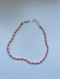 Colourful beaded anklet. Made to fit customer. Adjustable Pink Anklet With Colorful Beads, Pink Round Beads Anklets For Festival, Festival Anklets With Beaded Round Beads Chain, Festival Anklets With Beaded Chain, Casual Pink Beaded Chain Bracelets, Beads Anklets Ideas, Beaded Anklet, Beaded Anklets, Anklet Jewelry