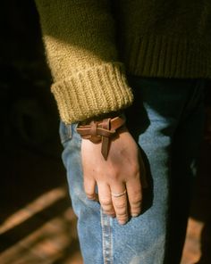 The Leather Knot bracelet is simple but elegant and fits right in at any occasion. Both the dark brown and natural versions age subtly and over time develop a beautiful patina unique to each person. It's no surprise this is our best-selling piece. "I appreciate the usefulness and beauty of knots and braiding incorporated in horse tack, especially the intricacy of Argentine gaucho saddlery. The knot bracelet is a simple, yet intriguing way to wear a piece of the west everyday." -Madi Phillips, Le Elegant Brown Cuff Bracelet As Gift, Elegant Brown Cuff Bracelet Gift, Brown Leather Strap Cuff Bracelet For Everyday, Classic Brown Leather Strap Jewelry, Everyday Brown Leather Strap Cuff Bracelet, Minimalist Leather Strap Bracelets For Everyday, Minimalist Everyday Leather Strap Bracelets, Classic Brown Jewelry With Leather Strap, Everyday Minimalist Leather Strap Bracelet