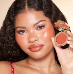 Easy-to-use terracotta cream blush & lip tint for a dewy, healthy-looking holiday blush and glow! Blush Model Photography, Orange Lip Makeup Look, Cheek Blush Makeup, Bridal Makeup For Brown Skin, Flushed Cheeks Aesthetic, Blush Product Photography, Orange Blush Makeup, Blush Photoshoot, Terracotta Makeup