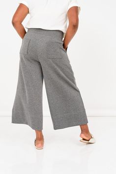 The Escape Wide Leg Pant is the perfect combination of travel-ready comfort and polished style. Made from a luxuriously soft, eco-friendly recycled material that feels like a mix of butter, silk, and clouds, these pants offer all-day comfort without sacrificing sophistication. Whether you’re pairing them with the Escape Poncho for a cozy, chic look or dressing them up with the Escape Cowl Neck Top, they elevate your “sweatpants” style to a whole new level. Ideal for both long flights and leisure Effortless High-waisted Loungewear Pants, Wide-leg Loungewear Sweatpants With Side Pockets, Effortless Wide Leg Loungewear Bottoms, Wide-leg Sweatpants With Side Pockets For Loungewear, Comfy Spring Pants With Pockets, Versatile Tapered Leg Loungewear Pants, Effortless High-waisted Loungewear Bottoms, Effortless High-waisted Lounge Pants, Effortless Wide-leg Loungewear Pants