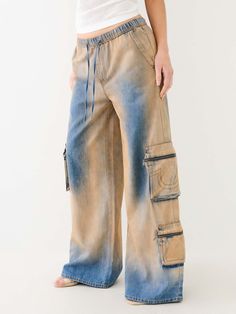 JESSIE VINTAGE WASH BAGGY CARGO JEAN Distressed Denim Blue Cargo Jeans For Fall, Fall Acid Wash Bottoms With Pockets, Fall Streetwear Washed Cargo Jeans, Washed Cargo Jeans For Streetwear In Fall, Washed Cargo Jeans For Fall Streetwear, Urban Baggy Faded Cargo Jeans, Urban Style Baggy Faded Cargo Jeans, Faded Denim Cargo Jeans For Streetwear, Urban Distressed Cargo Jeans For Fall