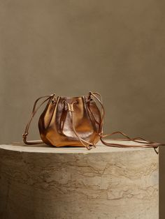 Pietra Bucket Bag | Banana Republic Mini Bucket Bag, Mini Bucket Bags, Mini Bucket, Metallic Leather, Leather Working, Snake Skin, Bucket Bag, Banana Republic, Leather Straps