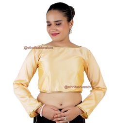 Golden Boat Neck Long Sleeve Ready Made Saree Blouse Product Description - Color - As Picture (Golden). We can supply this blouse in other colors as well. Golden, Dark Gold, White, Grey, Red, Orange, Maroon, Mustard, Yellow, Ice Blue, Royal Blue, Navy Blue, Olive Green, Green, Dark Green, Hot Pink, Baby Pink, Turquoise, Brown, Apple green, Purple, Magenta, etc Type - Back Hook / Prince Cut / Not Padded Size - Available from Bust - 30 to Bust Size 54 Neck Design -  Boat Neck Blouse (both front an Unstitched Yellow Long Sleeve Blouse, Long Sleeve Yellow Blouse With Pallu, Yellow Long Sleeve Blouse With Pallu, Party Yellow Padded Blouse, Yellow Long Sleeve Blouse For Wedding, Fitted Long Sleeve Yellow Blouse Piece, Fitted Long Sleeve Unstitched Blouse Piece, Yellow Fitted Long Sleeve Choli, Fitted Long Sleeve Padded Choli