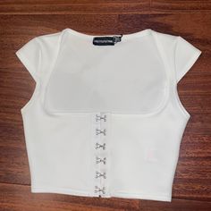 White Nwt Plt Crop Top. Very Low Scoop/Square Neck, With Hooks In The Front. Stretch Cropped Summer Corset, Summer Cropped Stretch Corset, Cropped Stretch Summer Corset, Summer Square Neck Corset For Night Out, Summer Night Out Square Neck Corset, Trendy Fitted Crop Top Corset, White Fitted Crop Top For Party, Fitted Square Neck Crop Top For Night Out, White Square Neck Corset For Spring