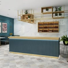 the interior of a restaurant with blue walls and gold trimmings on the counter