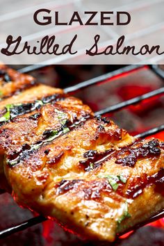 grilled salmon on the grill with text overlay that reads glazed grilled salmon