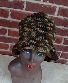 Women crochet camouflage bucket hat fits average size head and is warm and comfortable to wear during the cold season. Handmade women crochet hat comes from smoke free pet free home made in the United States.  Measurement approximate Width 20.5" Height 10" Brown Military Hat For Winter, Brown Crochet Hat With Curved Brim For Outdoor, Outdoor Brown Crochet Hat With Curved Brim, Adjustable Camouflage Bucket Hat With Curved Brim, Brown Curved Brim Crochet Hat For Outdoor, Winter Military Hat With Curved Brim, Brown Crochet Hat For Outdoor, One Size, Brown Crochet Hat For Outdoor, Casual Camouflage Bucket Hat For Outdoor