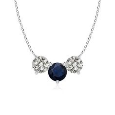 This three stone necklace with glimmering white diamonds and a blue sapphire will beautifully represent your undying love and commitment. Secured in 18k white gold prong settings, the three round gemstones appear to be floating on the chain. The arrangement looks spectacular and perfectly symbolizes the past, present and the future. Blue Sapphire Pendant, Undying Love, Gemstone Necklaces, Sapphire Pendant, White Diamonds, Three Stone, Stone Necklace, Gemstone Necklace, Diamond White