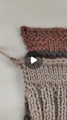 the video shows how to crochet an afghan stitch in two different colors and sizes