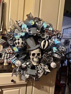 a wreath with skulls and other items on it