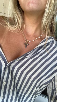 Our Half Pearl Shark Tooth Toggle Necklace features a 18K gold plated stainless steel paperclip chain and clasp, freshwater pearls, and a fossilized shark tooth. Whether you're dressing up or keeping it casual, this unique necklace is your go-to for adding a splash of coastal charm to any outfit.   Note: Every shark tooth is unique therefore size, color and shape will vary! Please be aware you will most likely NOT receive the exact tooth pictured, but you will receive one similar! If you have any questions or would like to see the exact teeth we have available please contact us before placing your order! Brandy Fits, Sharks Tooth, Teeth Pictures, Gifts Forbest Friend, Ocean Inspired Jewelry, Shark Tooth Necklace, Tooth Necklace, Toggle Necklace, Shark Tooth