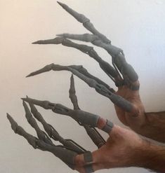 two hands that are made to look like claws