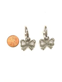 Lovely Vintage French Pave Set Rhinestone Crystal Bow EarringsThey measure about 1.35" x .95" They are shining in great condition with no stones missing and all are clear and bright. Rhinestone Dangle Earrings As Gift, Rhinestone Drop Earrings For Gift, Clip-on Diamond Earrings As A Gift, Sterling Silver Rhinestone Earrings Gift, Sterling Silver Earrings With Rhinestones For Gift, Gift Sterling Silver Earrings With Rhinestones, Diamond Earrings With Rhinestones As A Gift, Diamond Accented Clip-on Earrings As Gift, Diamond Clip-on Earrings For Gift