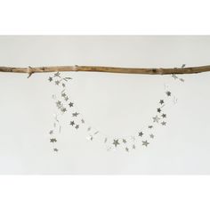 a branch with stars hanging from it