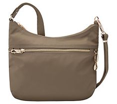 Enjoy extra piece of mind when it comes to your personal information, along with plenty of pockets for organized travel--whether it's across town or across the country--with this spacious hobo bag. From Travelon. Versatile Hobo Bag With Cell Phone Pocket For Travel, Travel Hobo Bag With Cell Phone Pocket, Crossbody Style, Travel Crossbody Hobo Bag With Cell Phone Pocket, Travel Hobo Bag With Zipper Pocket, Hobo Bag With Zipper Pocket For Travel, Hobo Travel Bag With Zipper Pocket, Travel Hobo Shoulder Bag With Zipper Pocket, Functional Hobo Bag With Zipper For Travel, Versatile Hobo Bucket Bag For Travel