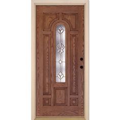 a wooden door with glass on the side