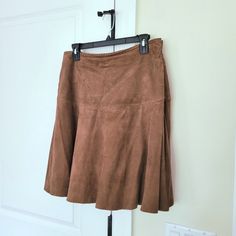 Soft, Genuine Goat Leather Unlined Side-Zip Closure Measures 17" Across Waist, 21" Hip, 34.5" Bottom Hem, 20.5" Long *Nwot In Excellent Condition - Minor Tiny Spot On Back Left (See Last Photo), But Hardly Noticeable! Brown Fitted Flared Skirt, Fitted Brown Flared Skirt, Fitted Flared Brown Mini Skirt, Fitted Brown Flared Mini Skirt, Vintage Brown Skirted Bottoms, Fitted A-line Brown Bottoms, Vintage Brown Lined Mini Skirt, Ralph Lauren Skirts, Suede Mini Skirt