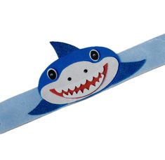 a close up of a toothbrush with a shark on it's head and teeth