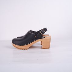 MADE FROM BEST QUALITY NUBUCK LEATHER AND ALDER WOOD Clogs for Women Lotta High heals ergonomic wooden sole and soft leather. Adjustable buckle clasp on the ankle. Stable heel. The sole is made of rubber. made to order. Available in sizes 36-41. For other sizes please contact me EUR 35 l UK 2.5 l AUS 4.5 l USA 5 l up to 22.3cm l 8.78 inches EUR 36 l UK 3.5 l AUS 5.5 l USA 6 l up to 23cm l 9.02 inches EUR 37 l UK 4 l AUS 6 l USA 6.5 l up to 23.7cm l 9.33 inches EUR 38 l UK 5 l AUS 7 l USA 7.5 l u Black High Heel Platform Clogs, High Heel Leather Clogs With Rubber Sole, Leather High Heel Clogs With Rubber Sole, Black High Heel Sandals With Rubber Sole, Casual Slingback Clogs With Wooden Heel, High Heel Leather Clogs With Heel Strap, Leather Slingback Clogs With Wooden Heel, Black Open Heel Clogs With Reinforced Heel, Casual Clogs With Heel Loop And High Heel