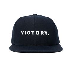 Victory Limited Edition Snapback - Navy/White Casual Baseball Cap With Logo Detail, Classic Six-panel Hat With Logo, Adjustable Cap With Logo Detail, Casual Cap With Logo Detail, Navy Snapback Hat With Embroidered Logo, Classic Adjustable Snapback Hat With Embroidered Logo, Sporty Navy Hat With Flat Brim, Navy Snapback Baseball Cap With Embroidered Logo, Classic Snapback Hat With Letter Print And Curved Bill