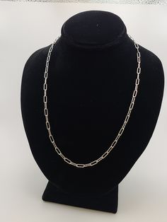 925 Silver Textured Paperclip Chain Necklace Item w #3367 Clean and in good condition  18 inched long with a Lobster claw Marked 925 4.9 grams Welcome to Westgate Jewels!! We specialize in vintage estate, designer, and fine jewelry. Our shop consists of items that are estate, antique, and / or vintage conditions unless otherwise noted. This means that most items are prior owned and may have some imperfections such as light scratches, scuffs, and / or patina. Our items are cleaned and polished pr White Gold Sterling Silver Paperclip Necklace, Oval White Gold Jewelry With Paperclip Chain, Classic Silver Chain Necklace With Oval Pendant, Formal Silver Necklace With Cable Chain, Sterling Silver Paperclip Cable Chain Necklace, Formal Oval Link Necklace With Lobster Clasp, White Gold Paperclip Chain Necklace For Formal Occasions, Formal White Gold Necklace With Paperclip Chain, Formal White Gold Paperclip Chain Necklace