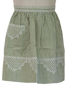 a green and white gingham skirt on a mannequin