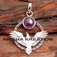 Natural Amethyst Round Gemstone Bird Pendant For Valentine's Day Gift - 925 Sterling Silver Designer Pendant Jewelry Length 1.75"- ap5090MATERIAL - 925 STERLING SILVERGEMSTONE - Amethyst PENDANT SIZE - 1.75" PENDANT WEIGHT - 5.95 GRAMSSTONE SIZE - 10 x 10 MM Symbolic Amethyst Jewelry For Gift, Purple Moonstone Round Jewelry, Symbolic Round Natural Stones Jewelry, Spiritual Silver Amethyst Gemstones, Lotus Pendant, Designer Handmade Jewellery, Pretty Pendant, Buddha Pendant, Bird Pendant