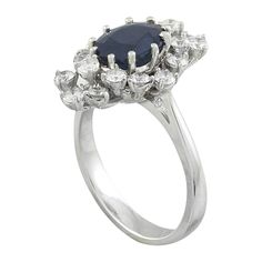 Stamped: 14K Total Ring Weight: 5.4 Grams Sapphire Weight 2.25 Carat (9.00x7.00 Millimeters)Diamond Weight: 1.00 carat (F-G Color, VS2-SI1 Clarity )Face Measures: 19.75x13.17 Millimeter SKU: [601131] Formal Cluster Sapphire Ring With Vvs Clarity, Formal Vvs Clarity Pear-shaped Sapphire Ring, Formal Vvs Clarity Cluster Sapphire Ring, Formal Pear-shaped Sapphire Ring With Vvs Clarity, Classic Oval Sapphire Ring With Prong Setting, Classic Pear-shaped Gemstone Rings, Classic Platinum Diamond Ring With Gemstone, Oval Brilliant Cut Sapphire Ring For Formal Occasions, Formal Sapphire Ring With Diamond And Prong Setting