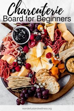 a platter with cheese, meats and crackers on it that says charcuterie board for beginners