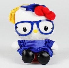 a hello kitty doll wearing glasses and a blue dress