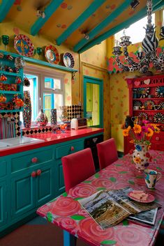 a colorful kitchen with lots of counter space