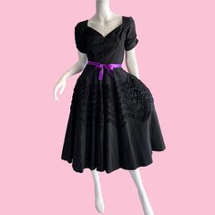 1950s Suzy Perette Dress. Vintage Fit N Flare Dress. 50s Sweeping party dress. Black taffeta ribbons dress. Classic iconic vintage design. Mid century design. Overall great condition  Glamorous gorgeous  Ready to wear. Size xs Chest 34 Waist 26 Hips open  Length 50 Only note-  Belt loops remain original belt does not. https://www.Etsy.com/shop/SHANNONMYINDI  FREE SHIPPING USl Suzy Perette Dress, Elegant Vintage Dress With Full Skirt For Party, 1950s Style Silk Party Dress, 1950s Style Silk Dresses For Vintage Events, 1950s Style Vintage Tea Length Evening Dress, Vintage Fitted Taffeta Dress, Fitted Vintage Taffeta Dress, 1950s Style Tea-length Vintage Cocktail Dress, 1950s Tea-length Vintage Cocktail Dress