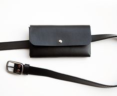 This slim leather waist bag is made of genuine black leather. It is perfect for phone, cards or other small items caring. On back side are two leather loops, so you can easily put it on a belt. Very stylish and perfect for festivals or traveling. You can use it also as small box clutch. You can choose this bag with or without the belt. Belt is 2,5 cm (~1 inch) wide. Waist circumference: 1. Waist 27.6 - 33.5 inch (70 - 85 cm); 2. Waist 31.5 - 37.4 inch (80 - 95 cm); 3. Waist 35.4 - 41.3 inch (90 Leather Waist Pack, Waist Bag Leather, Leather Tassel Keychain, Slimmer Belt, Leather Waist Bag, Handmade Belts, Leather Passport Holder, Leather Passport Cover, Box Clutch