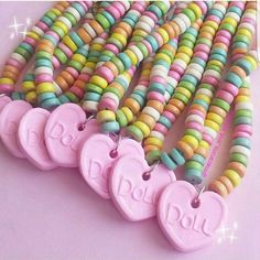 Remember those awesome candy necklaces you had as a kid? They came on stretchy string and were fun to wear and to eat. I made these necklaces inspired by those edible ones, and they look just like the real thing! But the best part of these is that they last forever. Details: Each necklace comes with rainbow "candy" beads in pastel shades and a large pastel pink "candy" heart pendant in the center, handmade by me from polymer clay. Choose your favorite message from the drop down box. These are ch Kawaii Candy, Dibujos Toy Story, Rainbow Choker, Kawaii Necklace, Candy Necklace, Pastel Candy, Personalized Candy, Candy Necklaces, Rainbow Candy