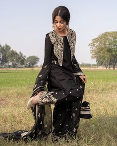 Elegant Pakistani Designer Salwar Kameez Dress Black Semi-stitched Palazzo Set With Mirror Work, Black Georgette Straight Kurta, Black Sharara For Eid, Traditional Black Straight Kurta Dress, Semi-stitched Black Dress With Dabka, Black Sharara With Resham Embroidery For Transitional Season, Black Semi-stitched Dress With Dabka Detailing, Black Palazzo Set For Eid, Transitional Black Sharara With Resham Embroidery