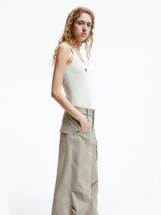 MO&Co. Women's Straight Leg Cargo Pants Elevate your casual style with our pants. Crafted from a comfy cotton blend, these pants offer a relaxed fit and wide legs that will pool effortlessly over your shoes. The folded details at the knee add a touch of industrial chic. Perfectly pairs with a fitted top for a laid-back yet trendy look. Features : - Relaxed fit, wide leg, full length- Knee pleated design, including belt- Multi cargo pockets and flap pocket at the back Code: MBD1PATT07The back len Summer Cotton Cargo Pants With Belt Loops, Versatile Tapered Leg Parachute Pants For Spring, Chic Cotton Parachute Pants With Tapered Leg, Versatile Spring Parachute Pants With Tapered Leg, Summer Relaxed Fit Parachute Pants With Belt Loops, Relaxed Fit Parachute Pants With Belt Loops For Spring, Summer Utility Bottoms With Tapered Leg, Versatile Wide-leg Cotton Parachute Pants, Summer Utility Cotton Wide Leg Pants