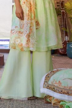 Green anarkali featuring floral mix printed motifs, pleated bodice and threadwork. Comes with matching palazzo and dupatta. - Aza Fashions Traditional V-neck Semi-stitched Salwar Kameez, V-neck Salwar Kameez With Dabka Work For Wedding, Diwali V-neck Sharara With Dupatta, Designer V-neck Sets For Eid, V-neck Salwar Kameez For Wedding And Eid, Unstitched Traditional Anarkali Set With V-neck, Traditional Unstitched Anarkali Set With V-neck, Traditional Pista Green Organza Kurta, Unstitched V-neck Traditional Anarkali Set