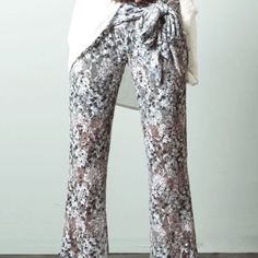 Ryu Floral Grey Lace Pants With Pops Of White And Turqoise, Sheer Lace Over Long Shorts. Elastic Waisband. Quantity: 4 Sizes Available: S, M, L Material Content: Lining - 100% Polyester, Lace Overlay - 90% Polyester, 10% Spandex Made In: China White Floral Print Ankle-length Pants, White Floral Print Ankle-length Bottoms, Non-stretch White Pants With Floral Print, White Floral Print Pants, Non-stretch White Floral Print Pants, White Non-stretch Floral Print Pants, White Floral Print Straight Pants, White Floral Print Trousers, White Bohemian Wide Leg Pants For Spring