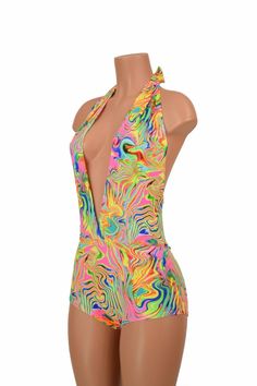 "This item is made to order, please read all the way through the listing before purchasing! This bodysuit is made of super bright neon flux uv glow print spandex! This fabric is beautifully smooth, breathable, very durable, and crazy stretchy. Deep V neckline and tie back halter top. Four way stretch for a figure forming fit. This bodysuit is unlined. Womens Sizing (See below for instructions on where measurements should be taken) XXS: Bust 29\"-30\" / Waist 22\"-23\" / Hips 30\"-32\" Extra Smal High Stretch Unitard For Club In Summer, Pink Summer Unitard, Summer Club Unitard, Rave Multicolor Bodysuit For Club, Rave Style Multicolor Bodysuit For Club, Stretch Disco Bodysuit For Summer, Multicolor Stretch Rave Unitard, Multicolor Fitted Rave Unitard, Summer Rave Fitted Unitard